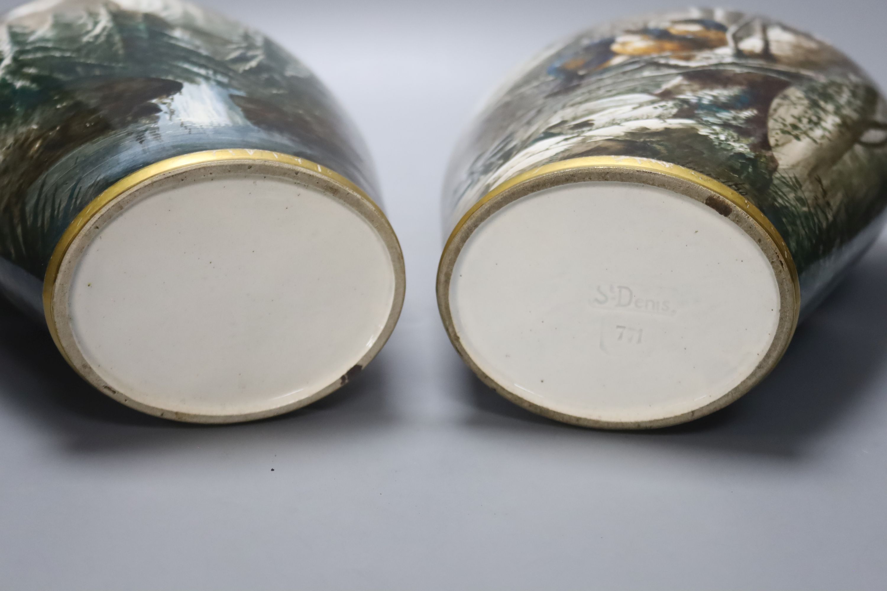 A pair of late 19th century French St Denis painted vases, decorated with birds in a landscape, signed by the artist, height 35cm